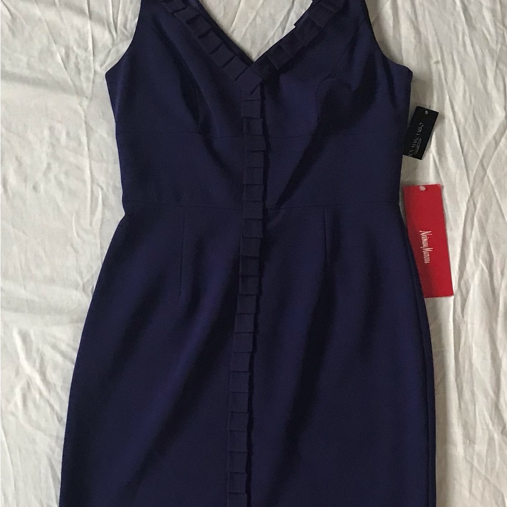 Crepe fully lined V-Neck with design around neck line and front. VERY ELEGANT